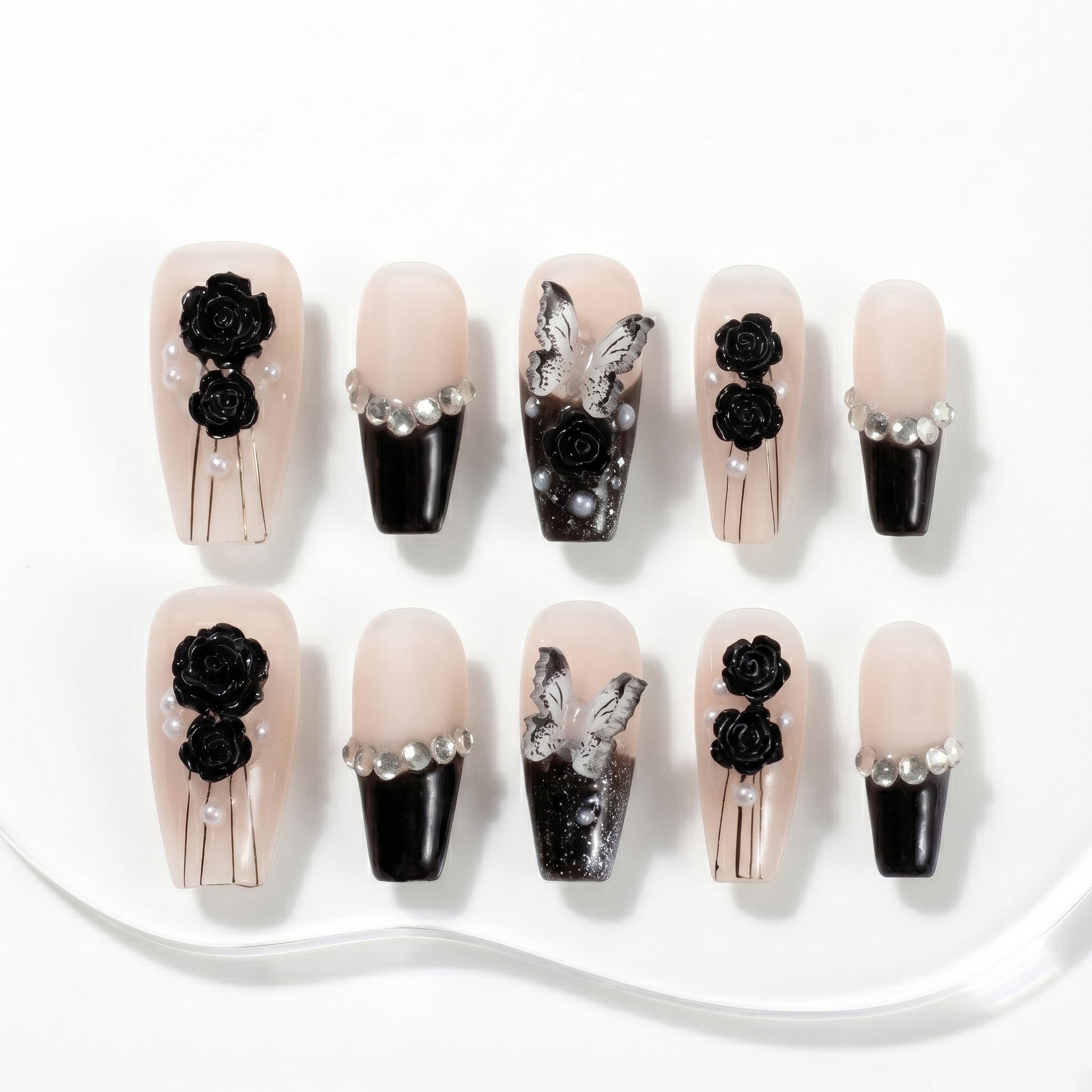 Faux ongles faits main rose nude et noir motif rose #069