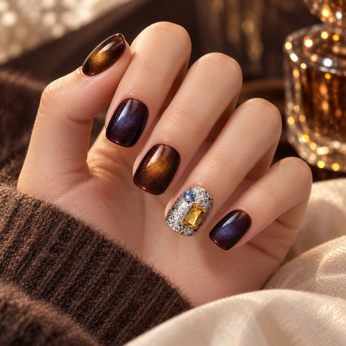 Illustration of a hand wearing the brown design beside a brown sleeve and warm lights.